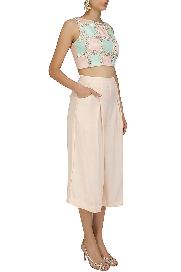 Pink and blue embroidered crop top with pink culottes available only at Pernia's Pop Up Shop.