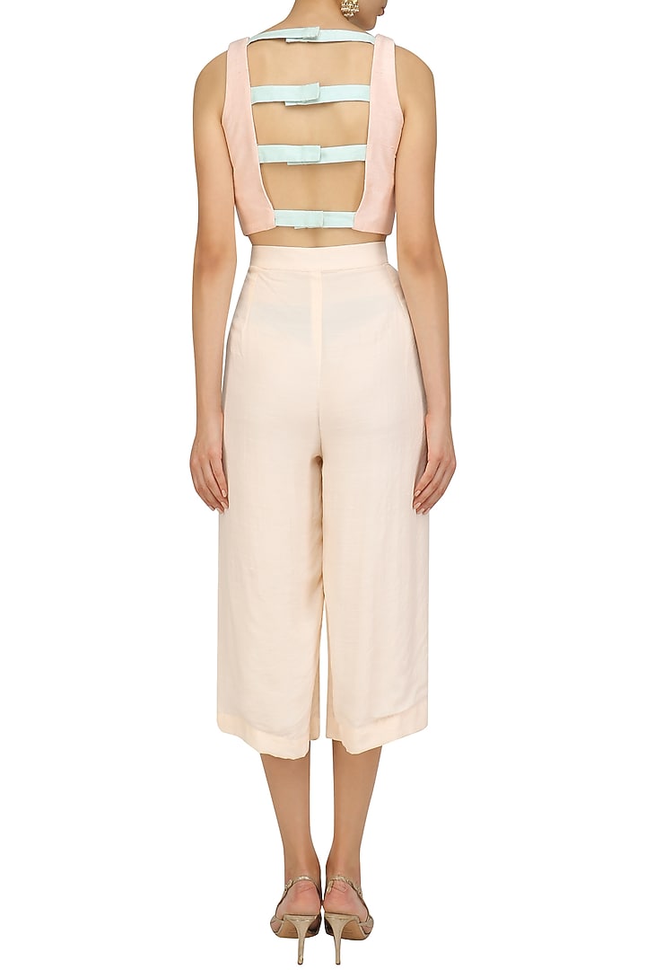 Pink and blue embroidered crop top with pink culottes available only at Pernia's Pop Up Shop.