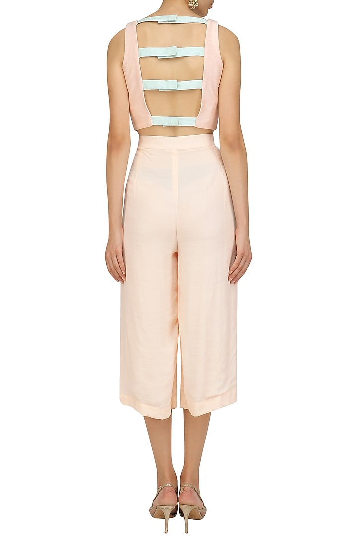 Pink and blue striped crop top with pink culottes available only at Pernia's Pop Up Shop.