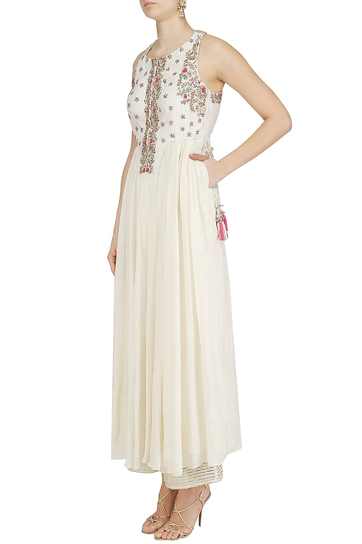 Ivory embroidered kurta and palazzo set available only at Pernia's Pop Up Shop.