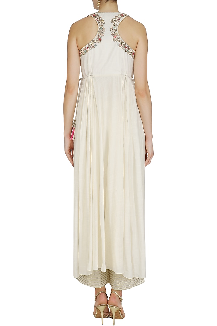 Ivory embroidered kurta and palazzo set available only at Pernia's Pop Up Shop.