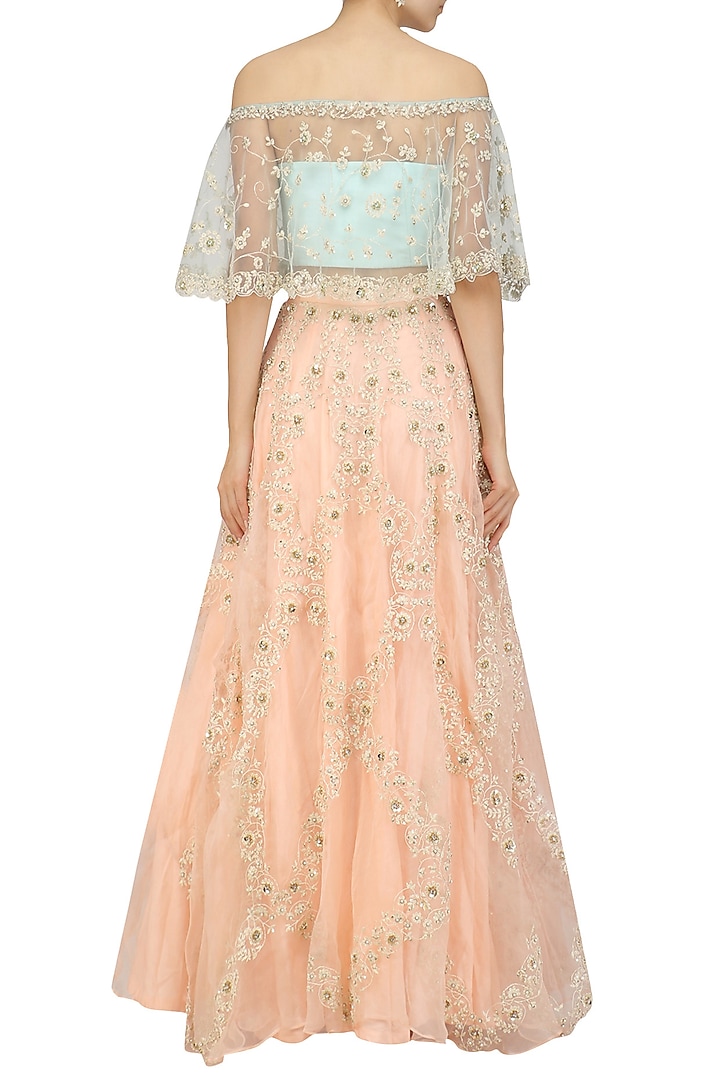 Mint embroidered off shoulder crop top with peach embellished lehenga available only at Pernia's Pop Up Shop.