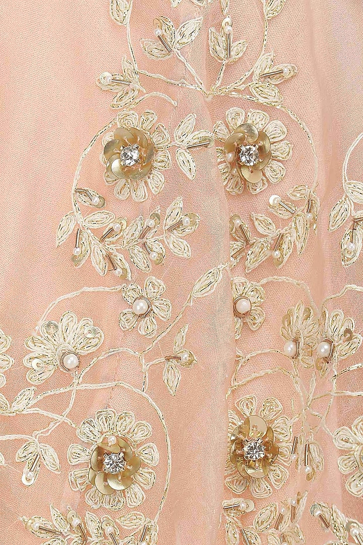 Mint embroidered off shoulder crop top with peach embellished lehenga available only at Pernia's Pop Up Shop.