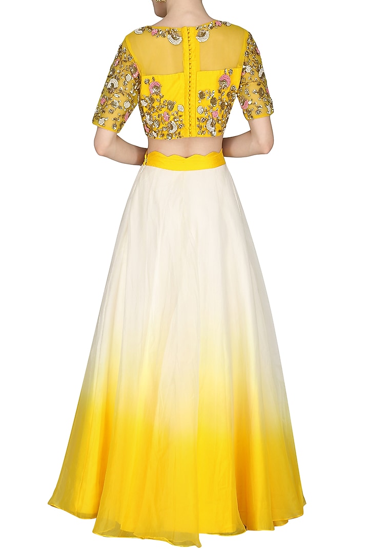 Yellow and ivory embroidered lehenga set available only at Pernia's Pop Up Shop.