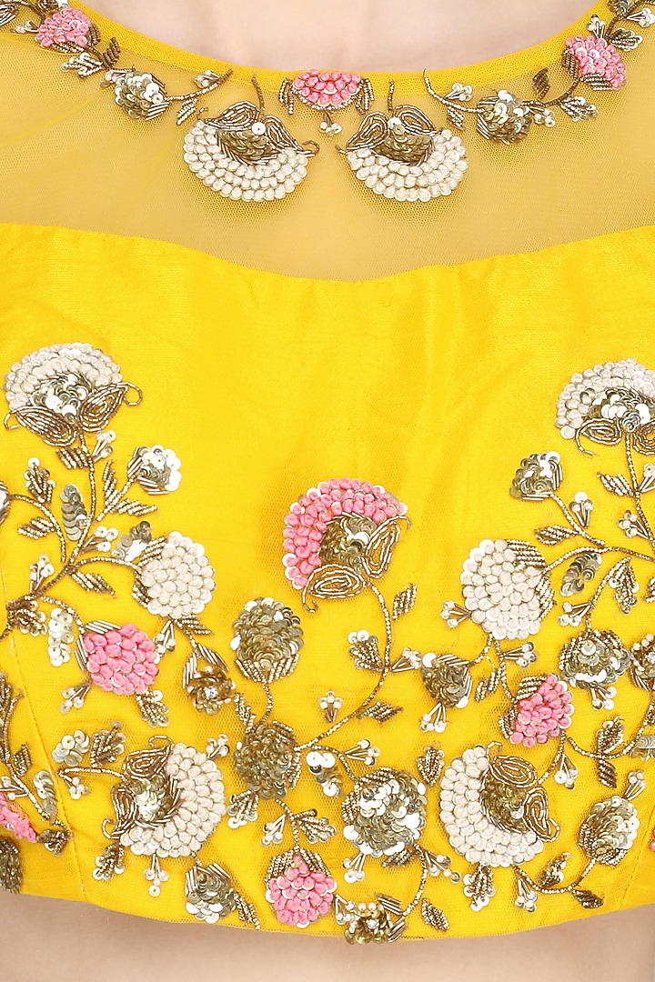 Yellow and ivory embroidered lehenga set available only at Pernia's Pop Up Shop.