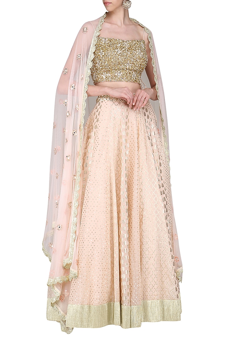 Peach embroidered lehenga set available only at Pernia's Pop Up Shop.