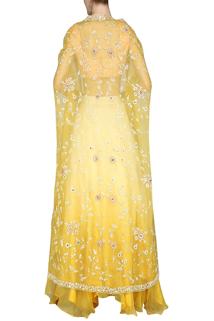 Yellow and ivory cape with blouse and skirt available only at Pernia's Pop Up Shop.