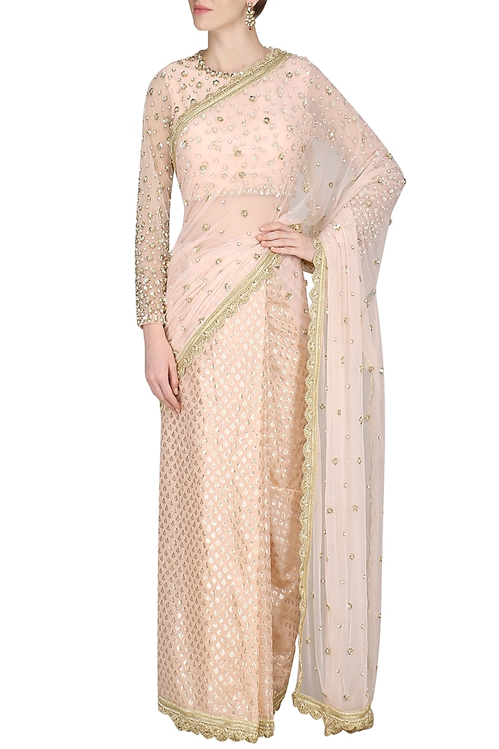 Peach sequin embroidered saree available only at Pernia's Pop Up Shop.