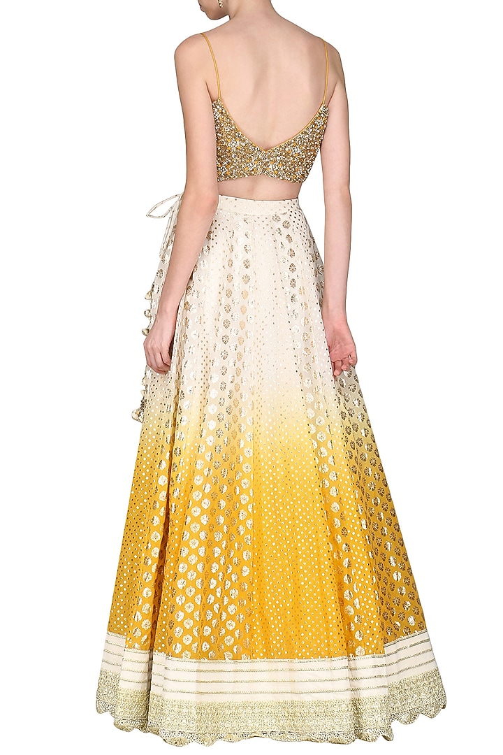 Yellow and ivory lehenga set available only at Pernia's Pop Up Shop.