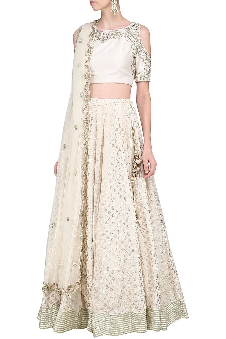 Ivory embroidred lehenga set available only at Pernia's Pop Up Shop.