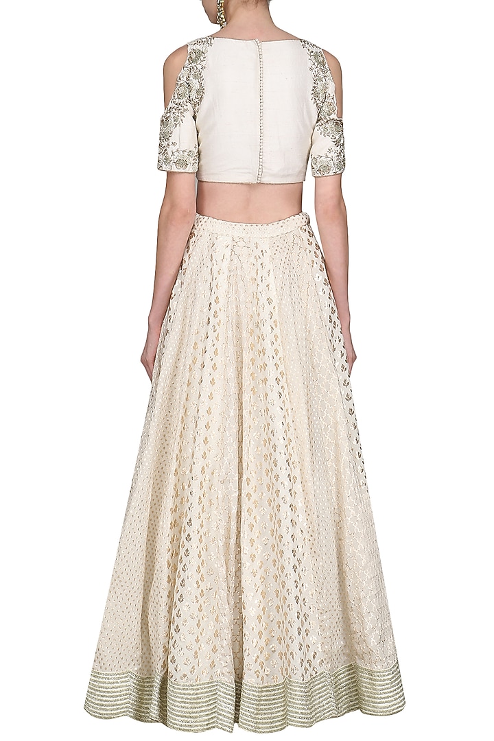 Ivory embroidred lehenga set available only at Pernia's Pop Up Shop.