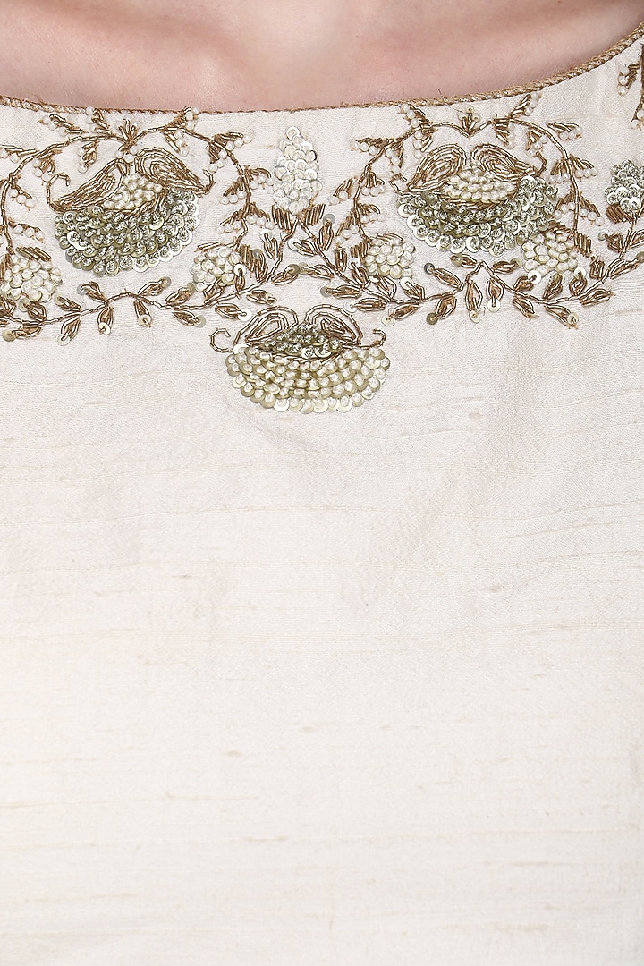 Ivory embroidred lehenga set available only at Pernia's Pop Up Shop.