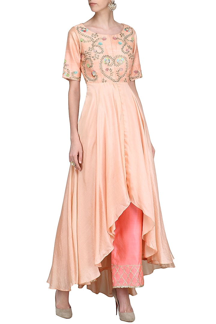 Peach high low embroidered kurta with pink palazzo pants available only at Pernia's Pop Up Shop.