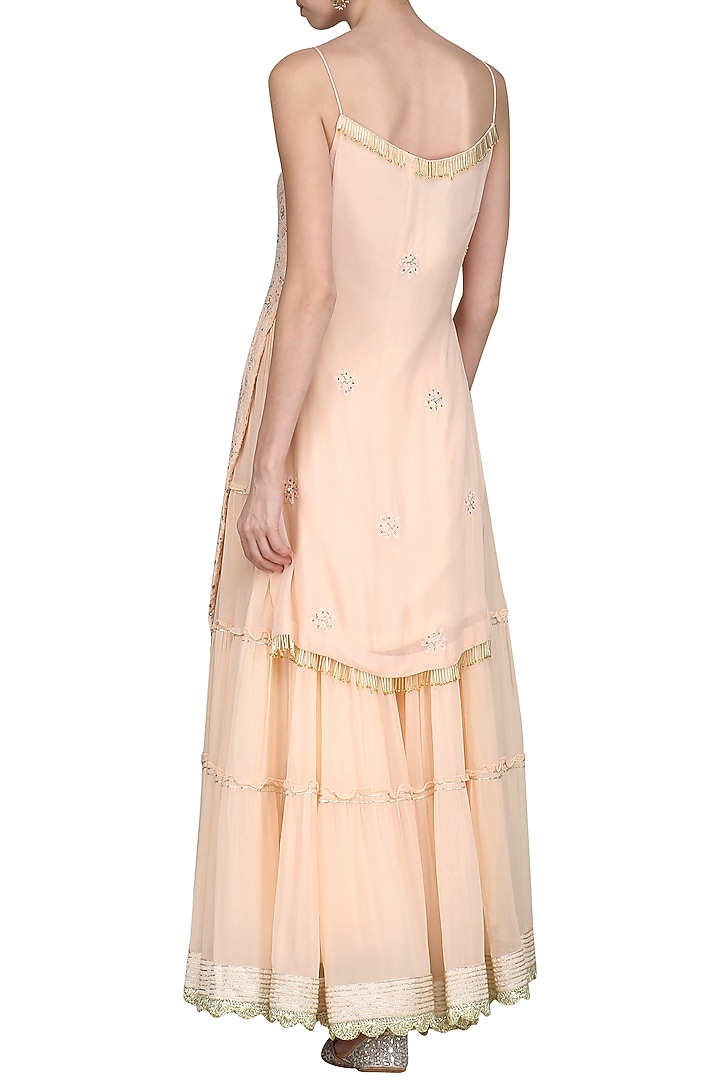 Peach lucknowi embroidered kurta with skirt and dupatta available only at Pernia's Pop Up Shop.