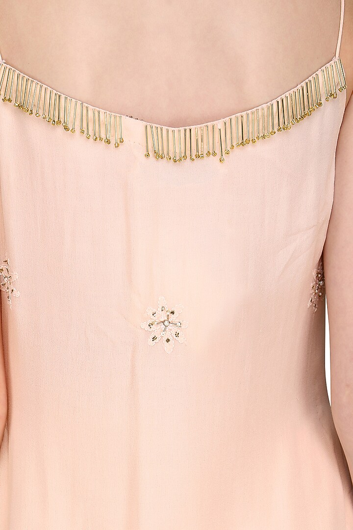 Peach lucknowi embroidered kurta with skirt and dupatta available only at Pernia's Pop Up Shop.