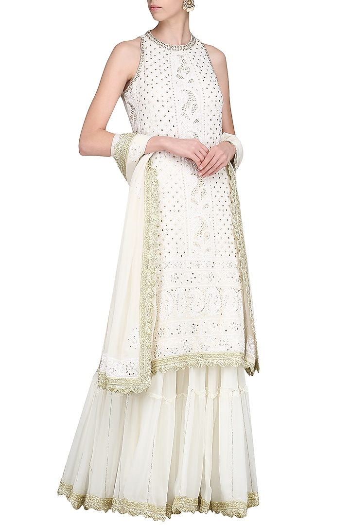 Ivory lucknowi embroidered kurta with skirt and dupatta available only at Pernia's Pop Up Shop.
