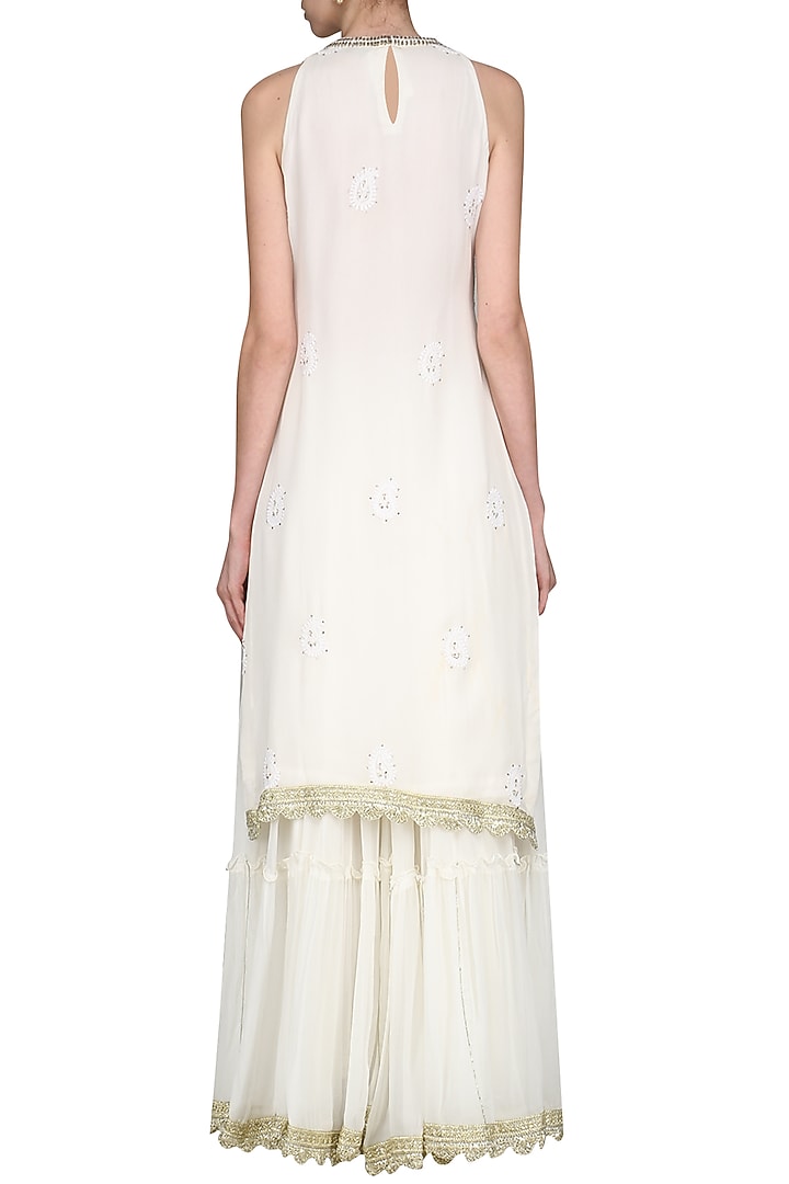 Ivory lucknowi embroidered kurta with skirt and dupatta available only at Pernia's Pop Up Shop.