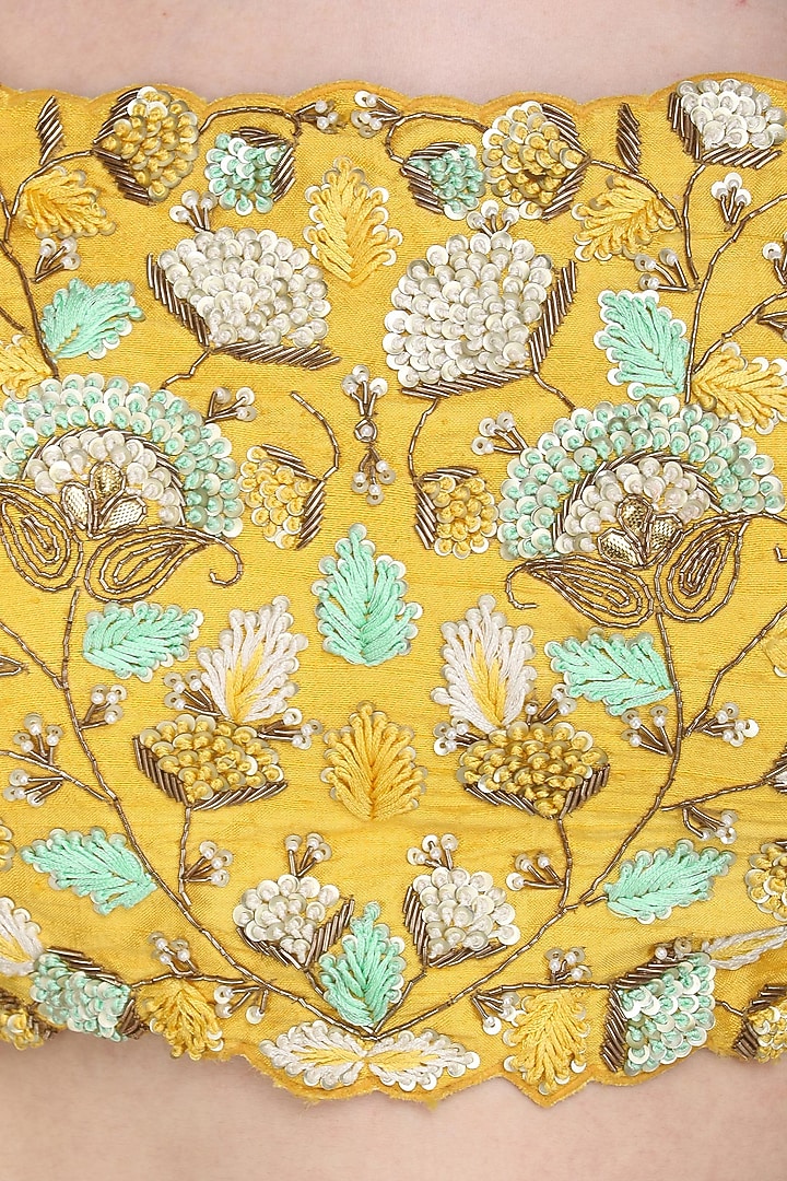 Mint green and yellow embroidered lehenga set available only at Pernia's Pop Up Shop.