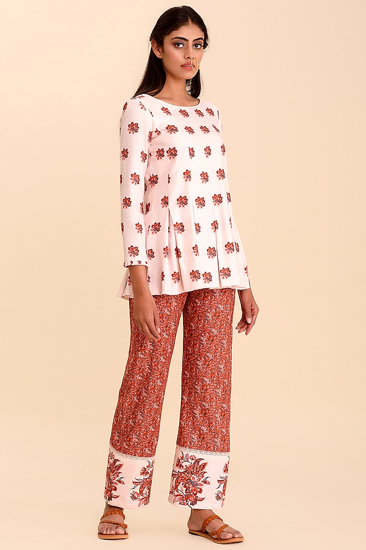 Pink Printed Top With Red Pants by Pasha