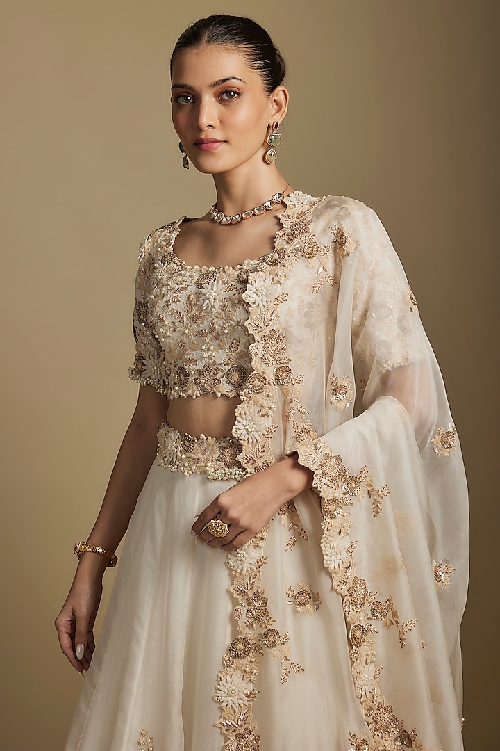 Ivory Organza Resham Work Bridal Lehenga Set by Prisho at Pernia's Pop Up Shop