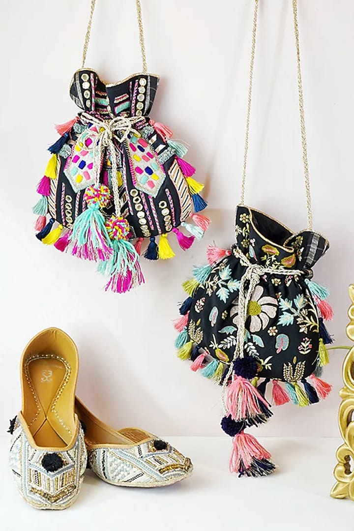 Black Crepe & Chanderi Embroidered Potli by PAYAL SINGHAL ACCESSORIES at Pernia's Pop Up Shop