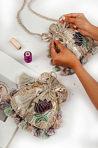 Crem Dupion Silk Hand Embroidered Potli by PAYAL SINGHAL ACCESSORIES