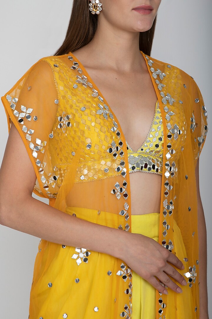 Yellow Embroidered Blouse With Dhoti Skirt & Orange Cape by Preeti S Kapoor at Pernia's Pop Up Shop