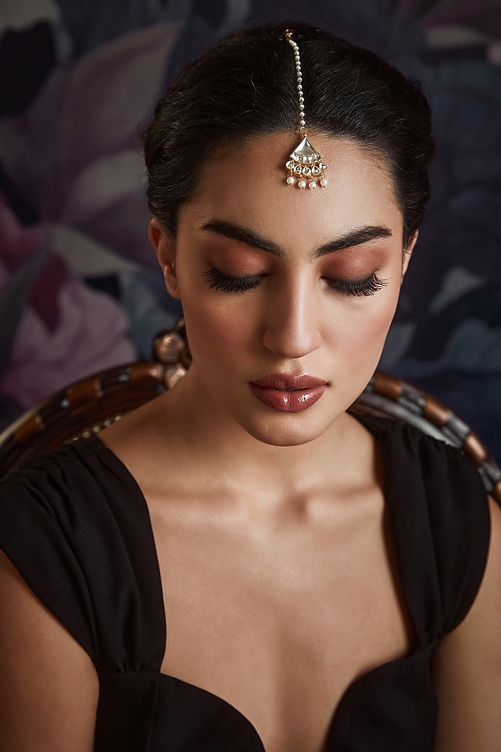 Gold Finish Kundan & Shell Pearl Maang Tikka by Paisley Pop at Pernia's Pop Up Shop