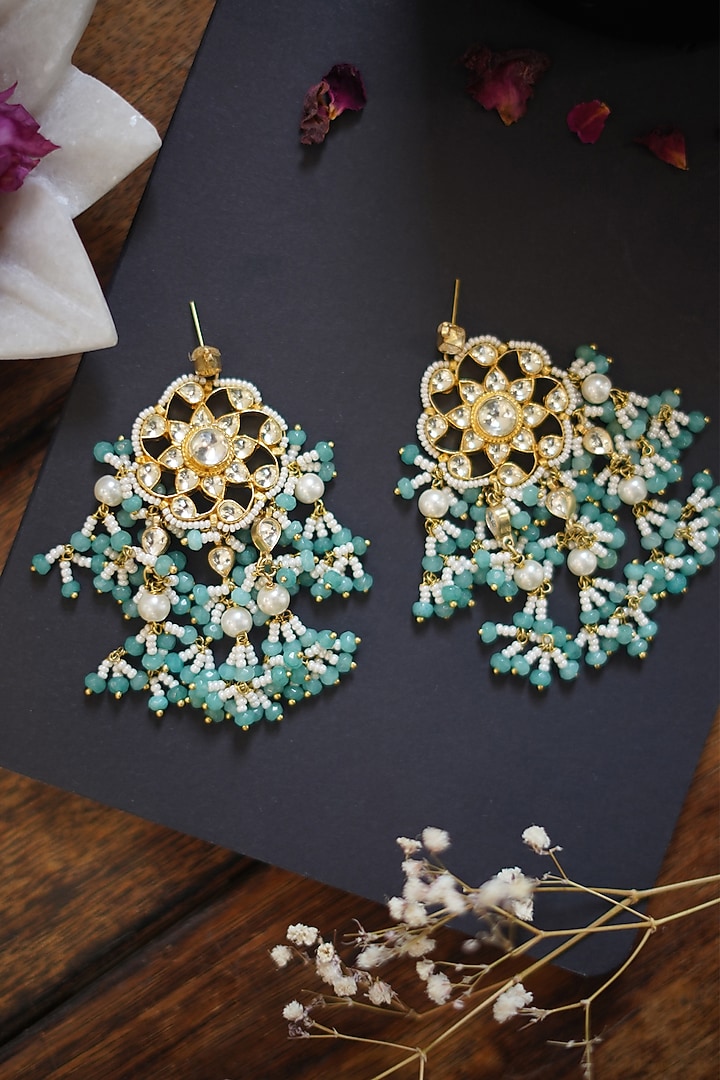 Gold Finish Kundan & Shell Pearl Earrings by Paisley Pop at Pernia's Pop Up Shop