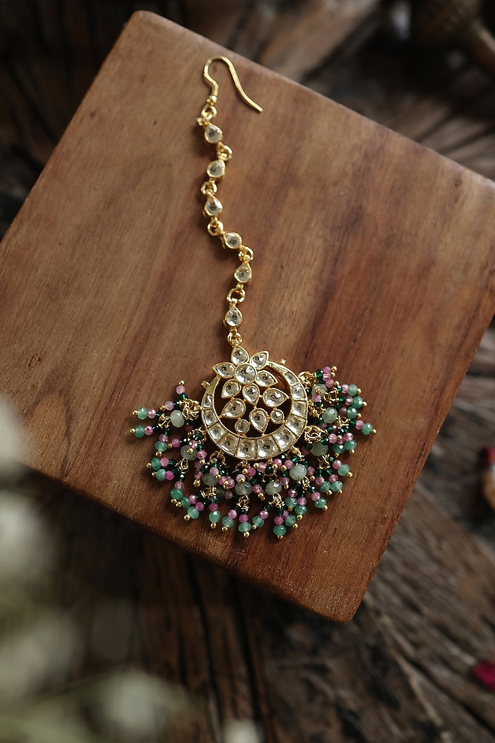 Gold Plated Kundan Polki & Green Semi-Precious Stone Maangtikka by Paisley Pop at Pernia's Pop Up Shop