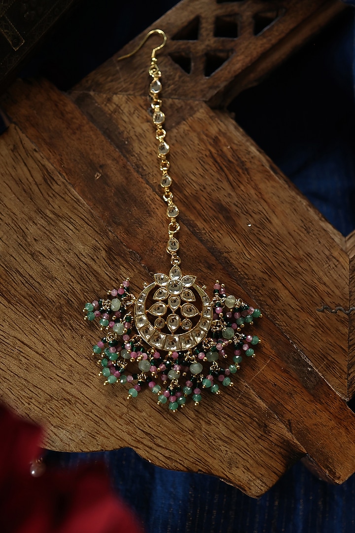 Gold Plated Kundan Polki & Green Semi-Precious Stone Maangtikka by Paisley Pop at Pernia's Pop Up Shop