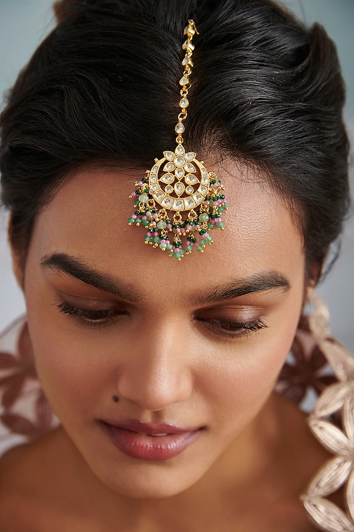 Gold Plated Kundan Polki & Green Semi-Precious Stone Maangtikka by Paisley Pop at Pernia's Pop Up Shop