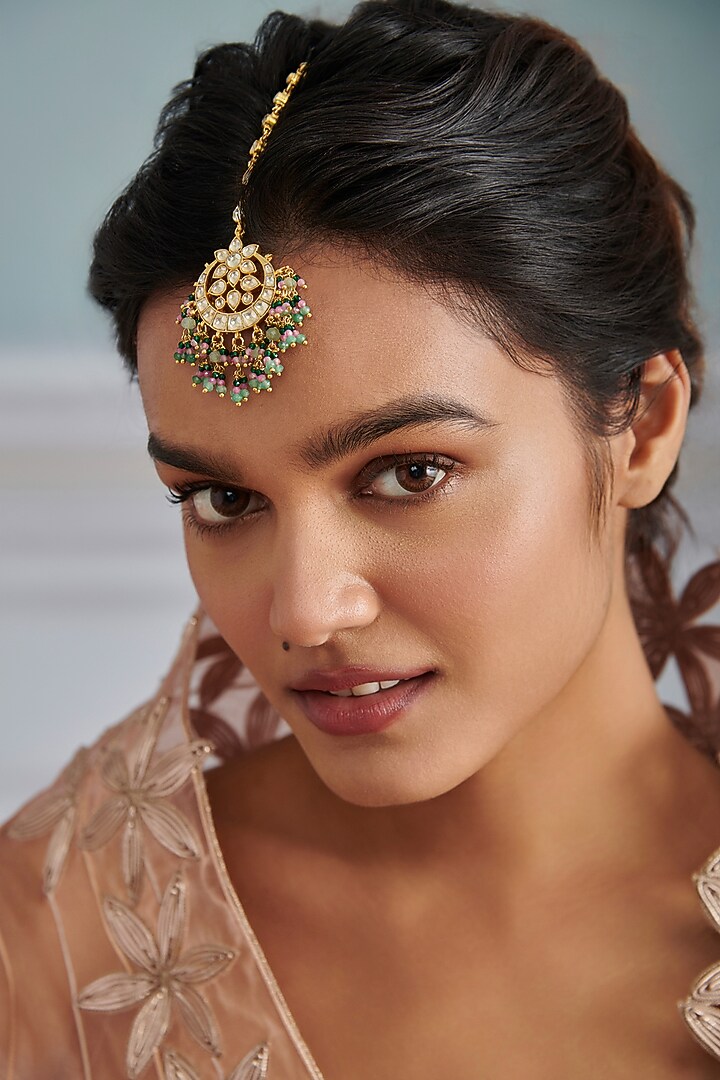 Gold Plated Kundan Polki & Green Semi-Precious Stone Maangtikka by Paisley Pop at Pernia's Pop Up Shop
