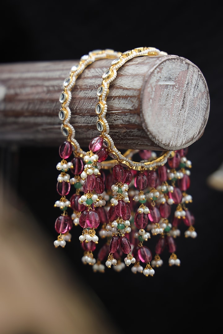 Gold Finish Kundan Polki & Natural Stone Bangles (Set Of 2) by Paisley Pop at Pernia's Pop Up Shop