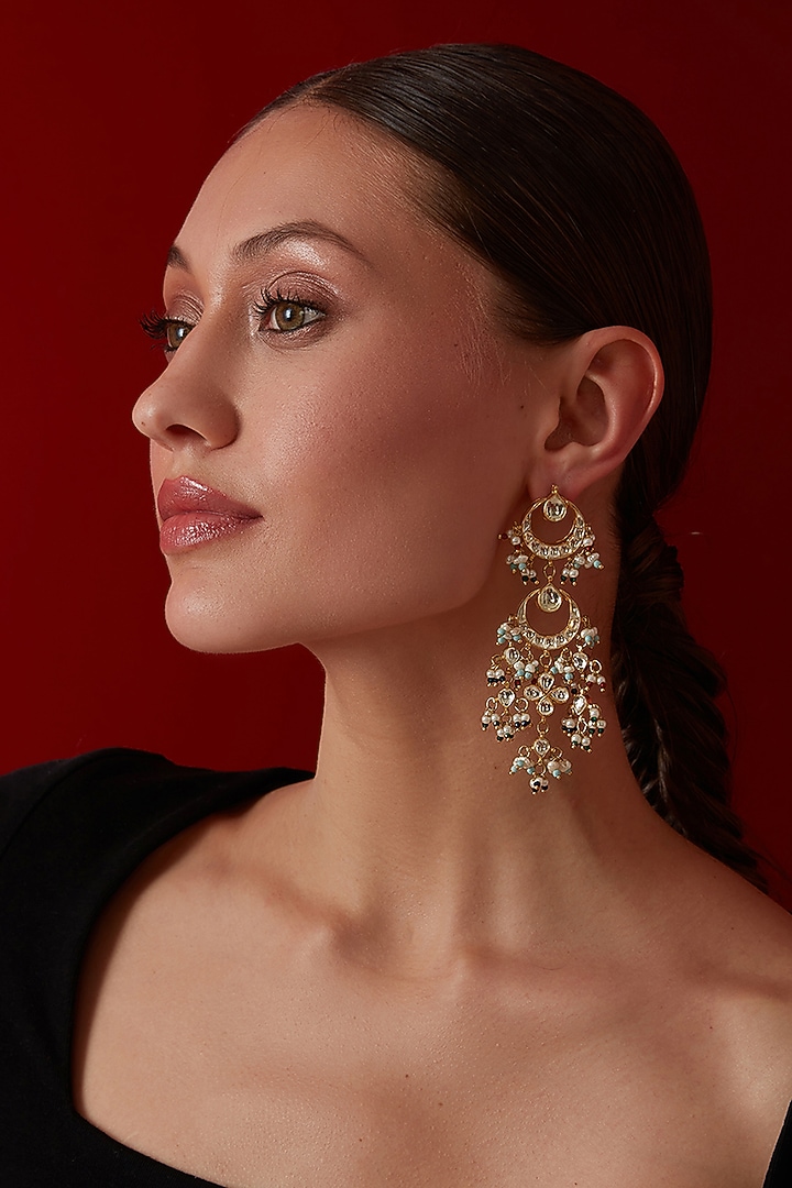 Gold Finish Kundan & Shell Pearl Dangler Earrings by Paisley Pop at Pernia's Pop Up Shop