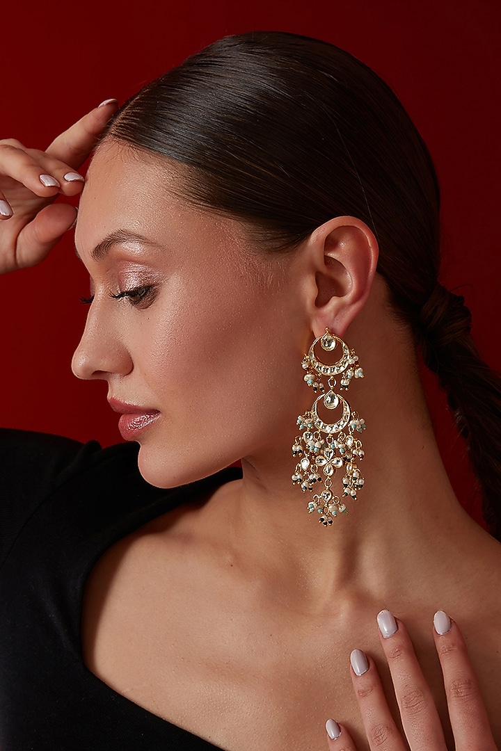 Gold Finish Kundan & Shell Pearl Dangler Earrings by Paisley Pop at Pernia's Pop Up Shop