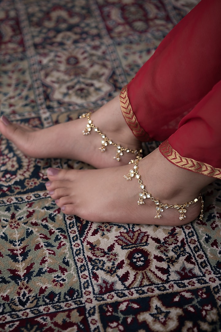 Gold Finish Kundan & Shell Pearl Anklets by Paisley Pop at Pernia's Pop Up Shop