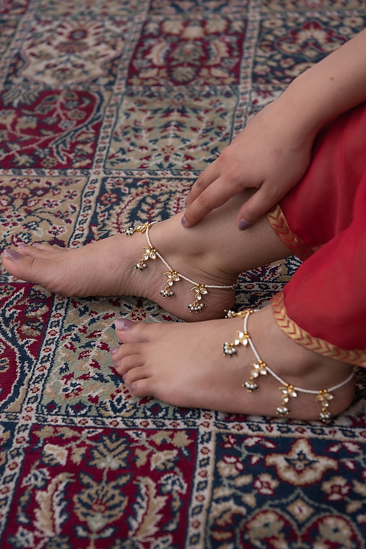 Gold Finish Kundan & Shell Pearl Anklets by Paisley Pop at Pernia's Pop Up Shop
