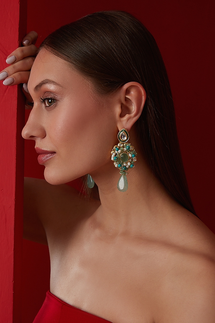 Gold Finish Kundan & Shell Pearl Dangler Earrings by Paisley Pop at Pernia's Pop Up Shop