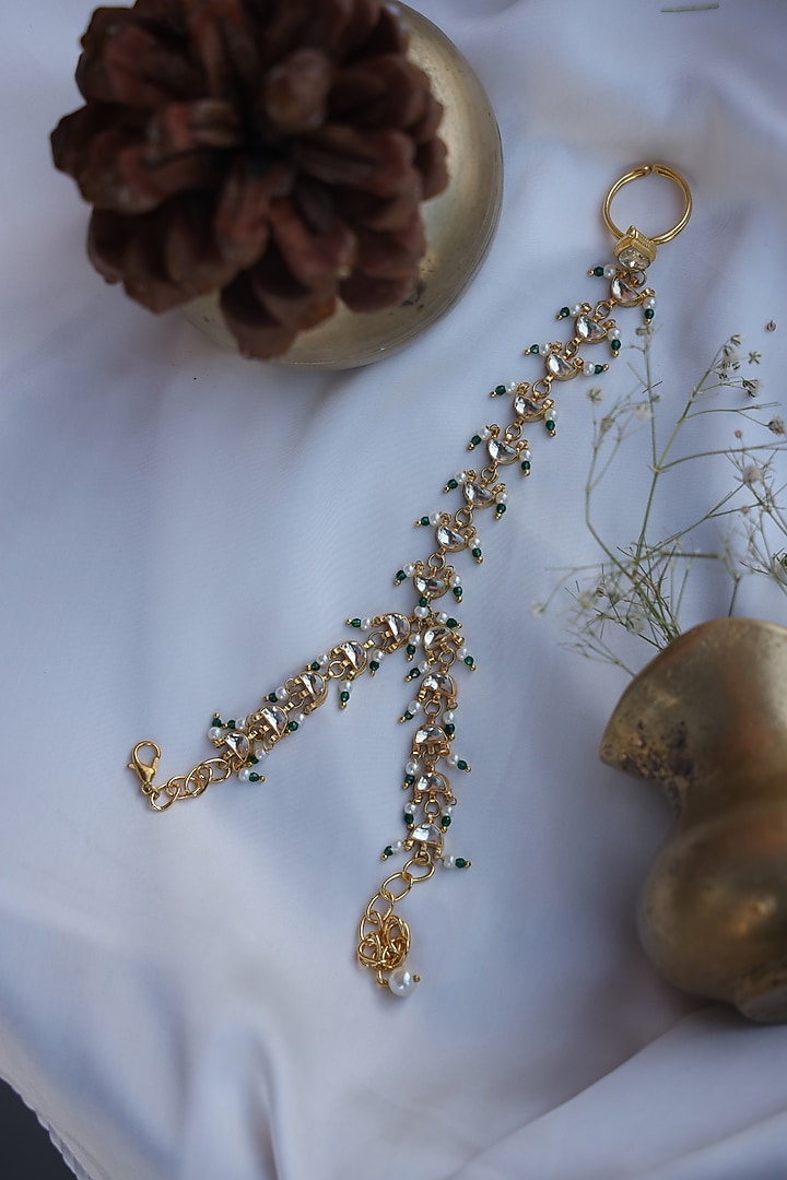 Gold Finish Kundan & Shell Pearl Hathphool by Paisley Pop at Pernia's Pop Up Shop