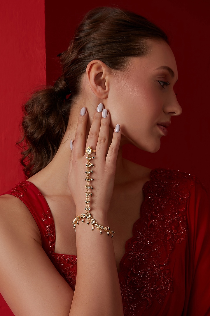 Gold Finish Kundan & Shell Pearl Hathphool by Paisley Pop at Pernia's Pop Up Shop