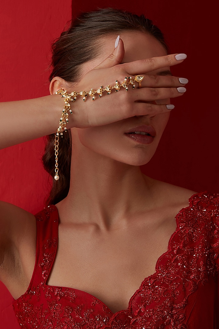 Gold Finish Kundan & Shell Pearl Hathphool by Paisley Pop at Pernia's Pop Up Shop