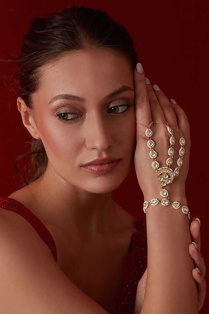 Gold Finish Kundan & Shell Pearl Hathphool by Paisley Pop at Pernia's Pop Up Shop