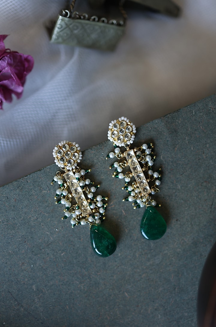 Gold Finish Kundan & Shell Pearl Dangler Earrings by Paisley Pop at Pernia's Pop Up Shop