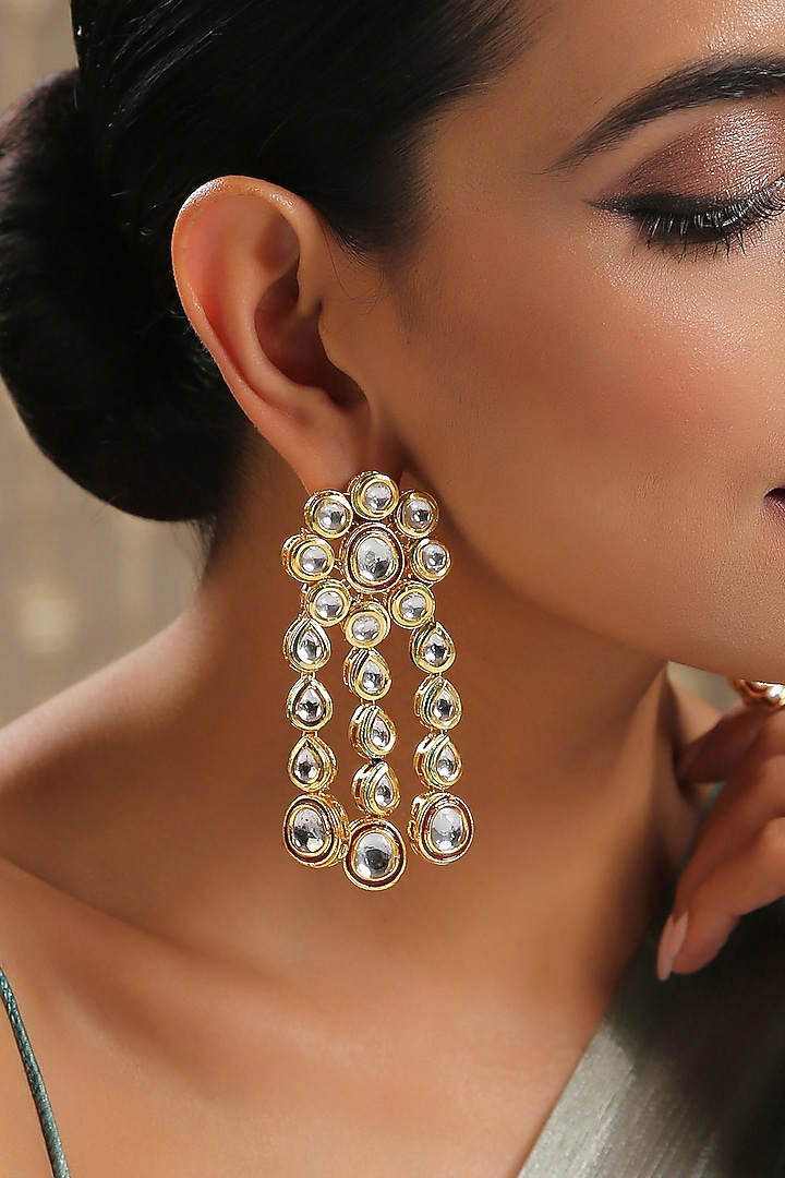 Gold Finish Kundan Polki Stud Earrings by Paisley Pop at Pernia's Pop Up Shop