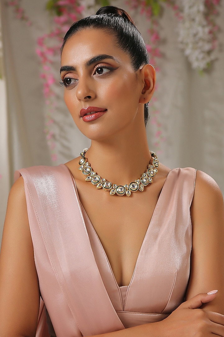 Gold Finish Floral Necklace Set by Paisley Pop at Pernia's Pop Up Shop