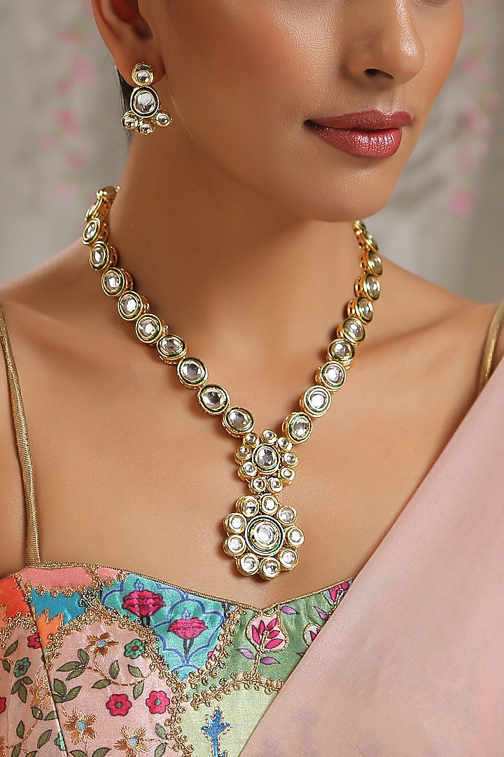 Gold Finish Kundan Polki Floral Necklace Set by Paisley Pop at Pernia's Pop Up Shop