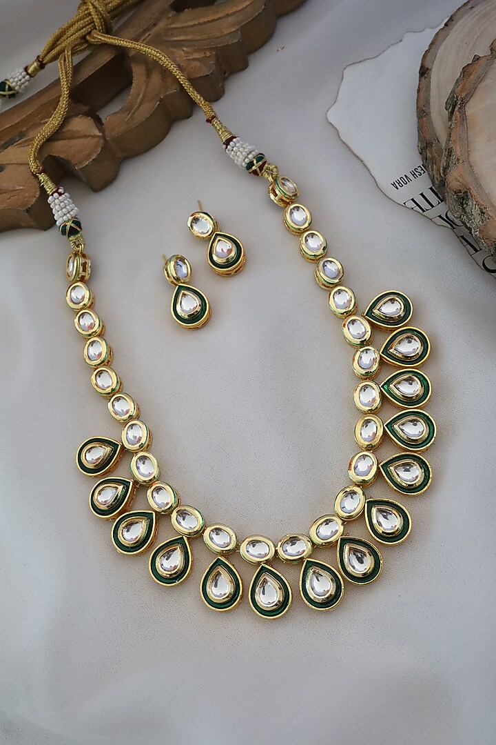 Gold Finish Kundan Polki Floral Necklace Set by Paisley Pop at Pernia's Pop Up Shop