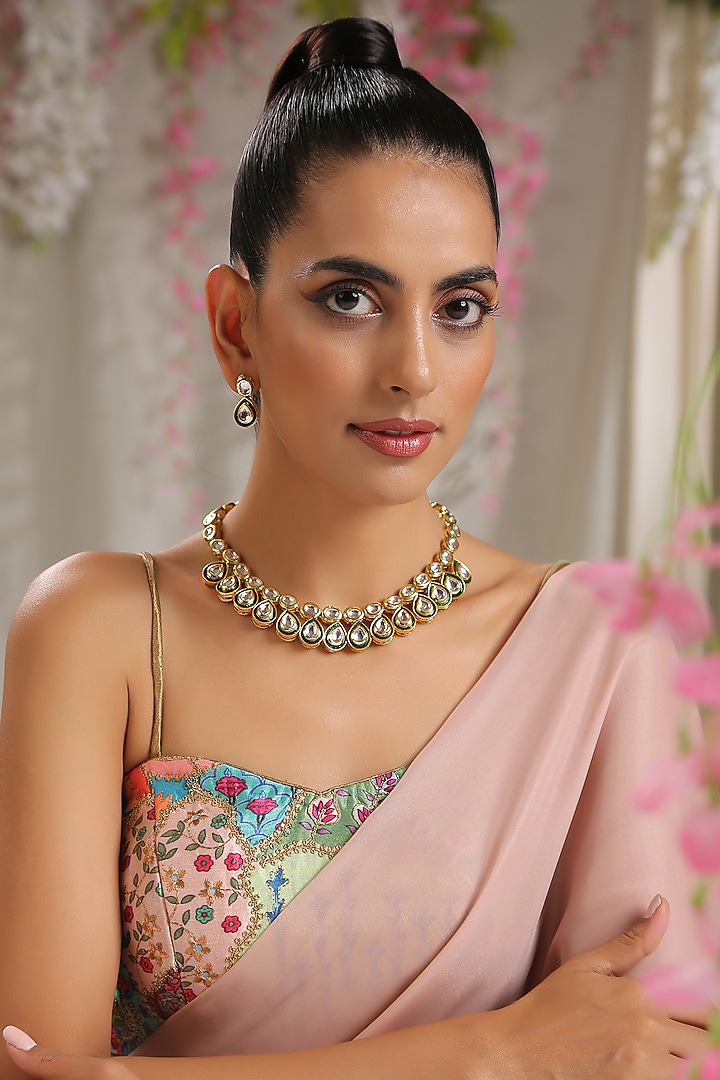 Gold Finish Kundan Polki Floral Necklace Set by Paisley Pop at Pernia's Pop Up Shop