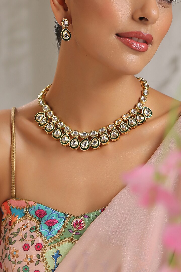 Gold Finish Kundan Polki Floral Necklace Set by Paisley Pop at Pernia's Pop Up Shop